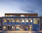 Het gebouw heeft drie bouwlagen met veel raampartijen en de gevel bevat blauwe glazuurtegels.